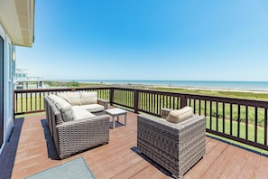Soak up the sun and have great conversations on the comfortable deck furniture