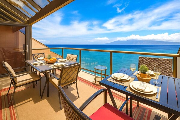 Dine al fresco with sweeping ocean views, fresh island air, and unforgettable sunsets right from your lanai table SOK-292