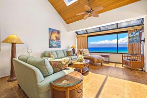 Bask in serenity where soft sage sofas meet sweeping sea views, kissed by sunbeams through lofty skylit ceilings  SOK-292