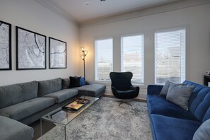 Gather and relax in the spacious living room with seating for everyone