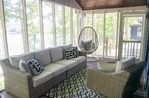 Screened in back porch overlooking lake 