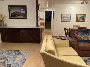 View of living room from entrance toward the upper bedroom.
