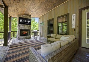 Gather around the cozy outdoor fireplace for memorable evenings under the stars.