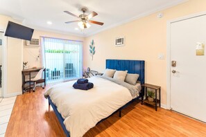 Queen-size bed with day light.