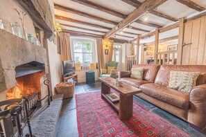 Bowmanstead Cottage Sitting Room with log fire