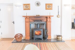 Smithy Cottage in Coniston Log burning stove