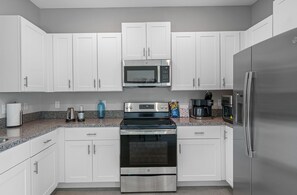 Kitchen with full amenities