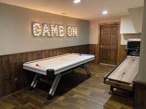 Electronic air hockey table and skee ball! Fun for everyone!