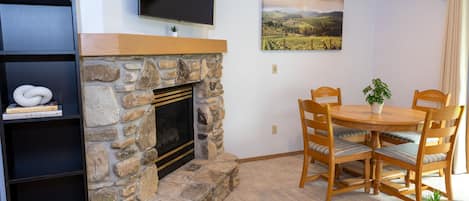 Dining area, and Smart TV provided. (gas fireplace not available for guest use)