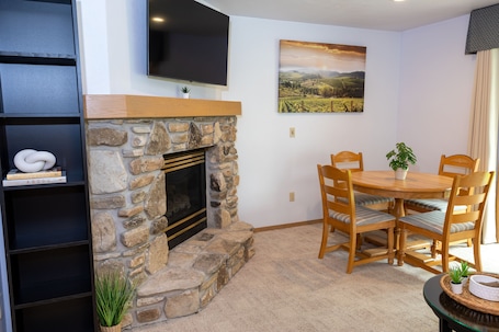 Dining area, and Smart TV (gas fireplace not available)