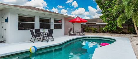 Gorgeous backyard with private pool. Grab a book and relax on a lounger!