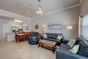 Indoor - Spacious open flow from living are into dining/kitchen areas