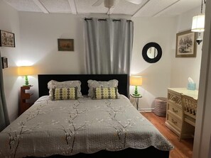 Master bedoom, king size bed, desk and closet