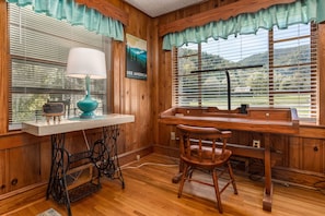 Working while visiting? Enjoy the mountain view from the desk.