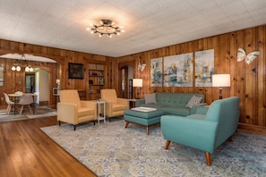 Rustic and modern blend together in the spacious and cozy living room.