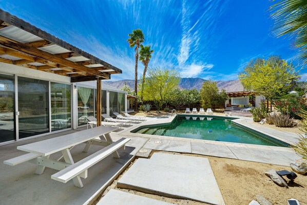 Large pool with mountain views