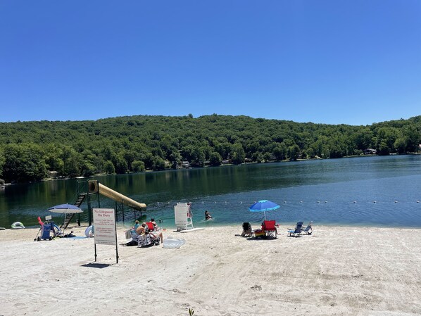 White sand beach, limited life guard during July and August.