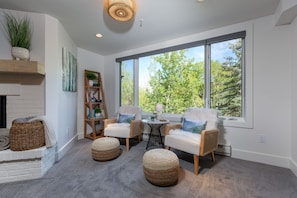 Gorgeous views of the mountains and ski slopes from the living/seating area.