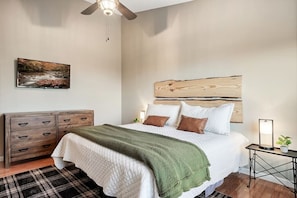 Our master bedroom includes a TV for your viewing pleasure and a dresser for unpacking during your stay