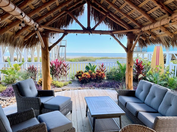 Relax beneath the palapa in the fully fenced backyard.