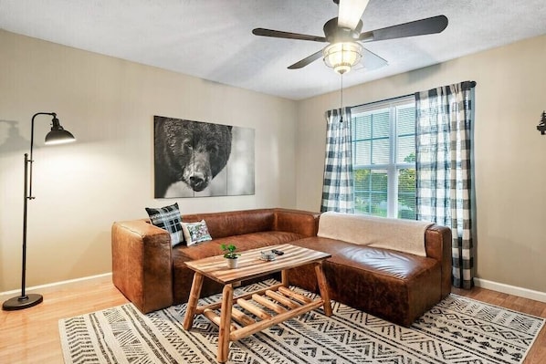 Our living area has a large leather couch! Perfect for relaxing after a long day exploring Dollywood or the Great Smokies ⎯ one of the best destinations in the entire country!