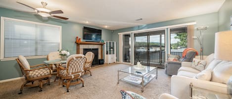 Living/dining with lake views and comfortable furniture!