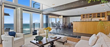 Enjoy ocean views from the open living room, dining area and kitchen.