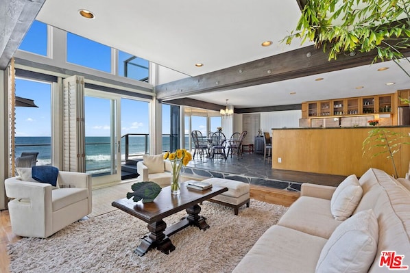 Enjoy ocean views from the open living room, dining area and kitchen.