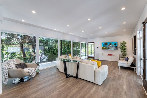 Window to Ceiling Open Floor Plan Living Space