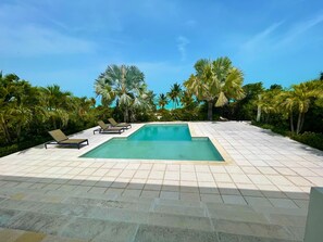 On site pool steps to the ocean that you can see in the background