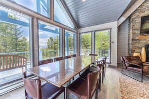 Dining area featuring seating for ten.