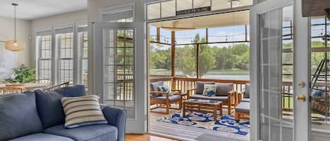 Living room opens to screened porch!