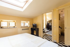 Bedroom with double bed, skylight window, ensuite bathroom, large wardrobe