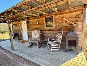 Front porch with rocking chairs to slow down and relax