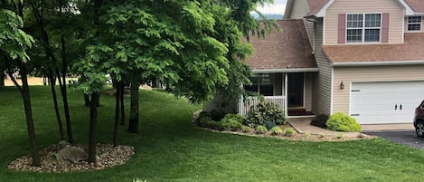 Front of house and side yard. Almost one acre. Part shade part sun in the yard.