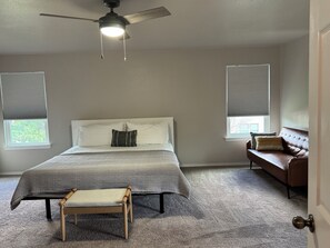 The master bedroom features a master bathroom and a spacious walking closet. 