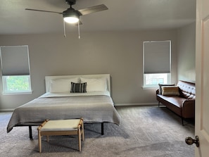 The master bedroom features a master bathroom and a spacious walking closet.