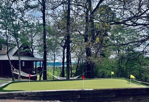 Putting Green, hammocks and lake views
