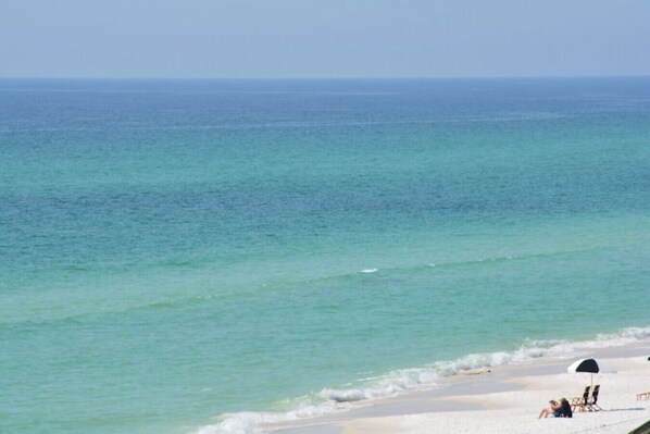 Beach just 1 block away, emerald green waters await!