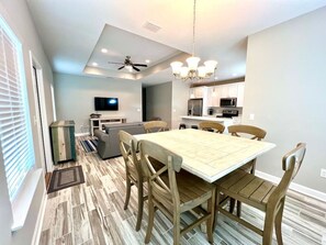 Open concept living, dining and kitchen