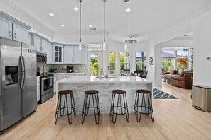 This gourmet kitchen stacked with gadgets will have the Chef in your group Wowed.