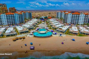 Las Palmas has 1 -2BR condos plus 3 -4BR villas.  Fabulous pool for little kids and huge 2-story tube slide for big kids.  Beachfront pool recently added. Walking distance to 6 restaurants including one onsite. Every room has an ocean view.