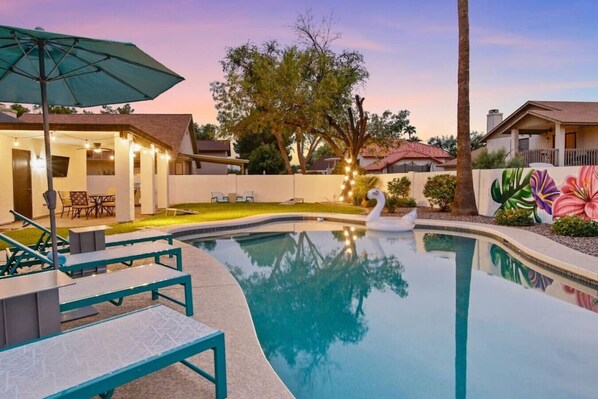 Taking a refreshing dip in our luxurious pool!