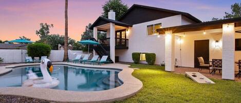 Taking a refreshing dip in our luxurious pool!