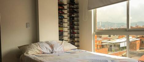 Naturally lit bedroom, with beautiful view and closet 