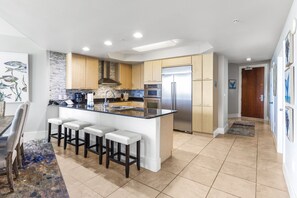 Large, gourmet kitchen with stainless steel applicances