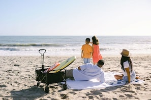 Grab the wagon and head to the beach 99ish steps away!