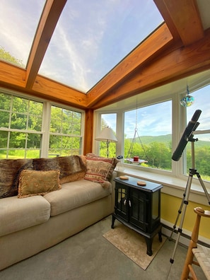 Sunroom roof windows allow for brightness and light in all seasons with views
