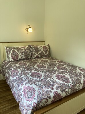 One of two bedrooms with double beds 