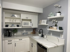 New quartz counter tops in the kitchen and bathroom